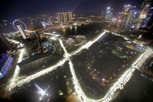 The Singapore F1 Grand Prix's Marina Bay City Circuit is illuminated during a light test as seen from Swissotel The Stamford, Tuesday, Sept. 16, 2014 in Singapore. (AP Photo/Wong Maye-E)