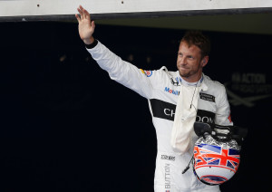 McLaren driver Jenson Button of Britain waves to the crowd after qualifying for the Malaysian Formula One Grand Prix at the Sepang International Circuit in Sepang, Malaysia, Saturday, Oct. 1, 2016. (AP Photo/Vincent Thian)