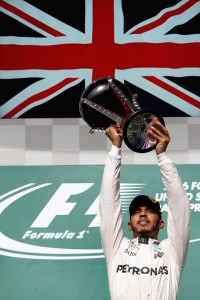 AUSTIN, TX - OCTOBER 23: Lewis Hamilton of Great Britain and Mercedes GP celebrates his win on the podium during the United States Formula One Grand Prix at Circuit of The Americas on October 23, 2016 in Austin, United States. Mark Thompson/Getty Images/AFP == FOR NEWSPAPERS, INTERNET, TELCOS & TELEVISION USE ONLY ==