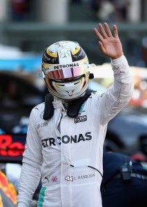 MEXICO CITY, MEXICO - OCTOBER 29: Lewis Hamilton of Great Britain and Mercedes GP waves to the crowd in parc ferme after qualifying in pole position during qualifying for the Formula One Grand Prix of Mexico at Autodromo Hermanos Rodriguez on October 29, 2016 in Mexico City, Mexico. Clive Mason/Getty Images/AFP == FOR NEWSPAPERS, INTERNET, TELCOS & TELEVISION USE ONLY ==