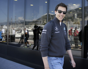 Mercedes team chief Toto Wolff smiles as he arrives at the Monaco racetrack, in Monaco, Wednesday, May 20, 2015. The Formula one race will be held on Sunday. (AP Photo/Luca Bruno)