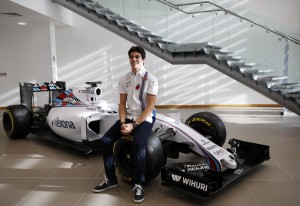 Canadian driver Lance Stroll poses for a photograph following the announcement by Williams Martini Racing of their driver line up for the 2017 FIA Formula One World Championship at the team headquarters in Grove, west of London on November 3, 2016. Canadian teenager Lance Stroll will replace veteran Felipe Massa in Williams's driver line-up for the 2017 season, the British team announced on Thursday. Stroll, who turned 18 last week, will line up alongside Finnish driver Valtteri Bottas, who will be entering his fifth successive year with Williams. / AFP PHOTO / Adrian DENNIS