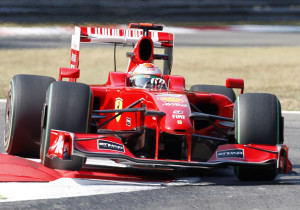 Giancarlo Fisichella, of Italy, steers his Ferrari during the first free practice session for the Italian Formula one Grand Prix, in Monza, Italy, Friday, Sept. 11, 2009. (AP Photo/Antonio Calanni)