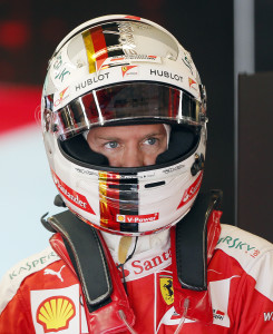 Ferrari driver Sebastian Vettel, of Germany, prepares to drive in the first practice session for the Formula One U.S. Grand Prix auto race at the Circuit of the Americas, Friday, Oct. 21, 2016, in Austin, Texas. (AP Photo/Tony Gutierrez)