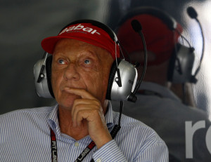 Former Formula One champion and Mercedes non-executive chairman Niki Lauda of Austria watches timing screens during the second practice session for Sunday's Malaysian Formula One Grand Prix at Sepang, Malaysia, Friday, March 22, 2013. (AP Photo/Lai Seng Sin)