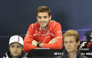 Marussia driver Jules Bianchi of France, top, addresses the media with Williams driver Felipe Massa of Brazil, left, and Mercedes driver Nico Rosberg of Germany, ahead of Sunday's Belgian Formula One Grand Prix in Spa-Francorchamps, Belgium, Thursday, Aug. 21, 2014. (AP Photo/Yves Logghe) / TT / kod 436