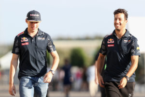 SUZUKA, JAPAN - OCTOBER 06: Daniel Ricciardo of Australia and Red Bull Racing and Max Verstappen of Netherlands and Red Bull Racing walk in the Paddock during previews ahead of the Formula One Grand Prix of Japan at Suzuka Circuit on October 6, 2016 in Suzuka. (Photo by Mark Thompson/Getty Images)