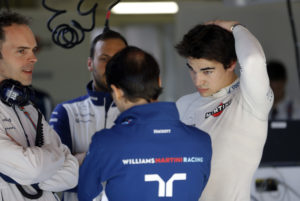Williams driver Lance Stroll of Canada, right, looks at fellow team driver Felipe Massa of Brazil during a Formula One pre-season testing session at the Catalunya racetrack in Montmelo, outside Barcelona, Spain, Wednesday, March 1, 2017. (AP Photo/Francisco Seco)