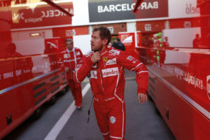 Ferrari driver Sebastian Vettel of Germany walks along the paddock at the end a Formula One pre-season testing session at the Catalunya racetrack in Montmelo, outside Barcelona, Spain, Thursday, March 9, 2017. (AP Photo/Francisco Seco)