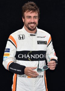McLaren's Spanish driver Fernando Alonso poses for a photo in Melbourne on March 23, 2017, ahead of the Formula One Australian Grand Prix. / AFP PHOTO / Saeed KHAN / -- IMAGE RESTRICTED TO EDITORIAL USE - STRICTLY NO COMMERCIAL USE --