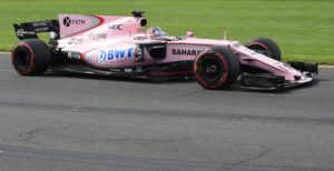 Force India's Mexican driver Sergio Perez powers through a corner during the first practice session for the Formula One Australian Grand Prix in Melbourne on March 24, 2017. / AFP PHOTO / Paul Crock / -- IMAGE RESTRICTED TO EDITORIAL USE - STRICTLY NO COMMERCIAL USE --