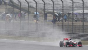 McLaren Formula One driver Jenson Button of Britain drives on his way to winning the Chinese Formula One Grand Prix at the Shanghai International Circuit in Shanghai, China, Sunday, April 18, 2010. (AP Photo/Eugene Hoshiko)