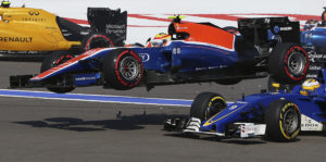 Manor driver Rio Haryanto of Indonesia flies over Sauber driver Marcus Ericsson of Sweden during an accident at the start of the Formula One Russian Grand Prix at the Sochi Autodrom racetrack in Sochi, Russia, Sunday, May 1, 2016.(AP Photo/Denis Tyrin)
