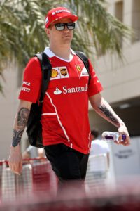 Ferrari's Finnish driver Kimi Raikkonen arrives to the paddock ahead of the Formula One Bahrain Grand Prix at the Sakhir circuit in the desert south of the Bahraini capital, Manama, on April 14, 2017. The Formula One season continues with April 16, 2017, Bahrain Grand Prix. / AFP PHOTO / ANDREJ ISAKOVIC