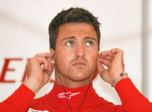 ** FILE ** German Toyota Formula One driver Ralf Schumacher adjusts his earplugs during the first practice session at the Istanbul Park racetrack, Turkey, in this Aug. 24, 2007 file photo. A report that Ralf Schumacher is taking a year off from racing increased speculation on Thursday, Dec. 27, 2007 that his Formula One career may be permanently over. German news agency DPA said it had learned of the break from people associated with the 32-year-old Schumacher, who left the Toyota team last month. The agency gave no names and the German driver was not available for comment. Schumacher hasn't been able to sign on with an established team for the coming season, which starts March 16 with the Australian Grand Prix. (AP Photo/Daniel Maurer, file)