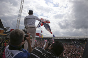 Mercedes driver Lewis Hamilton of Britain celebrates after winning the British Formula One Grand Prix at the Silverstone racetrack, Silverstone, England, Sunday, July 10, 2016. (AP Photo/Luca Bruno)
