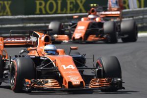 Spain's Fernando Alonso, left, and Belgian F1 driver Stoffel Vandoorne of McLaren steer their cars during Formula One Hungarian Grand Prix on the Hungaroring circuit in Mogyorod, 23 kms north-east of Budapest, Hungary, Sunday, July 30, 2017. (Zoltan Mathe/MTI via AP)