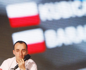 FILE - This is a Thursday, March 14, 2013 file photo of former Formula One driver Robert Kubica at a news conference in Warsaw, Poland. Kubica, who last raced in F1 seven years ago, will drive the Renault F1 car on Tuesday, Aug. 1, 2017, in the first of two days of testing at the Hungaroring circuit in Hungary (AP Photo/Czarek Sokolowski, file)