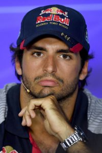 Torro Rosso's Spanish driver Carlos Sainz Jr listens during a press conference at the Autodromo Nazionale circuit in Monza on August 31, 2017 ahead of the Italian Formula One Grand Prix. / AFP PHOTO / ANDREJ ISAKOVIC