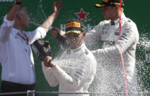 Mercedes driver Lewis Hamilton of Britain celebrates after winning during the Italian Formula One Grand Prix, at the Monza racetrack, Italy, Sunday, Sept. 3, 2017. (AP Photo/Antonio Calanni)