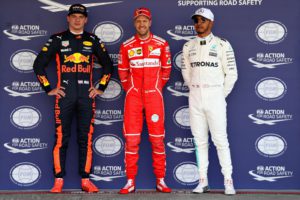 MEXICO CITY, MEXICO - OCTOBER 28: Top three qualifiers Sebastian Vettel of Germany and Ferrari, Max Verstappen of Netherlands and Red Bull Racing and Lewis Hamilton of Great Britain and Mercedes GP pose for a photo in parc ferme during qualifying for the Formula One Grand Prix of Mexico at Autodromo Hermanos Rodriguez on October 28, 2017 in Mexico City, Mexico. Mark Thompson/Getty Images/AFP == FOR NEWSPAPERS, INTERNET, TELCOS & TELEVISION USE ONLY ==
