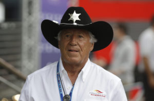Italian American former Formula One world champion Mario Andretti walks in the paddock at the Monza racetrack, in Monza, Italy , Thursday, Sept. 4 , 2014. The Formula one race will be held on Sunday. (AP Photo/Luca Bruno) / TT / kod 436