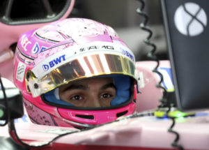 Force India driver Esteban Ocon of France waits in his car during the first practice session at the Japanese Formula One Grand Prix at Suzuka, Japan, Friday, Oct. 6, 2017. (AP Photo/Eugene Hoshiko)
