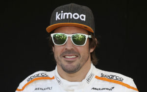 McLaren driver Fernando Alonso of Spain poses for a photo at the Australian Formula One Grand Prix in Melbourne, Thursday, March 22, 2018. The first race of the 2018 seasons is on Sunday. (AP Photo/Rick Rycroft)