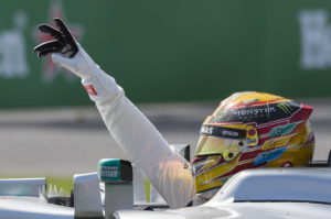 Mercedes driver Lewis Hamilton, of Britain, gestures after winning the Canadian Grand Prix auto race Sunday, June 11, 2017, in Montreal. (Graham Hughes/The Canadian Press via AP)