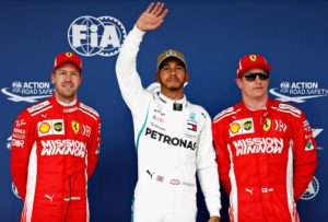 AUSTIN, TX - OCTOBER 20: Top three qualifiers Lewis Hamilton of Great Britain and Mercedes GP, Sebastian Vettel of Germany and Ferrari and Kimi Raikkonen of Finland and Ferrari celebrate in parc ferme during qualifying for the United States Formula One Grand Prix at Circuit of The Americas on October 20, 2018 in Austin, United States. Will Taylor-Medhurst/Getty Images/AFP == FOR NEWSPAPERS, INTERNET, TELCOS & TELEVISION USE ONLY ==