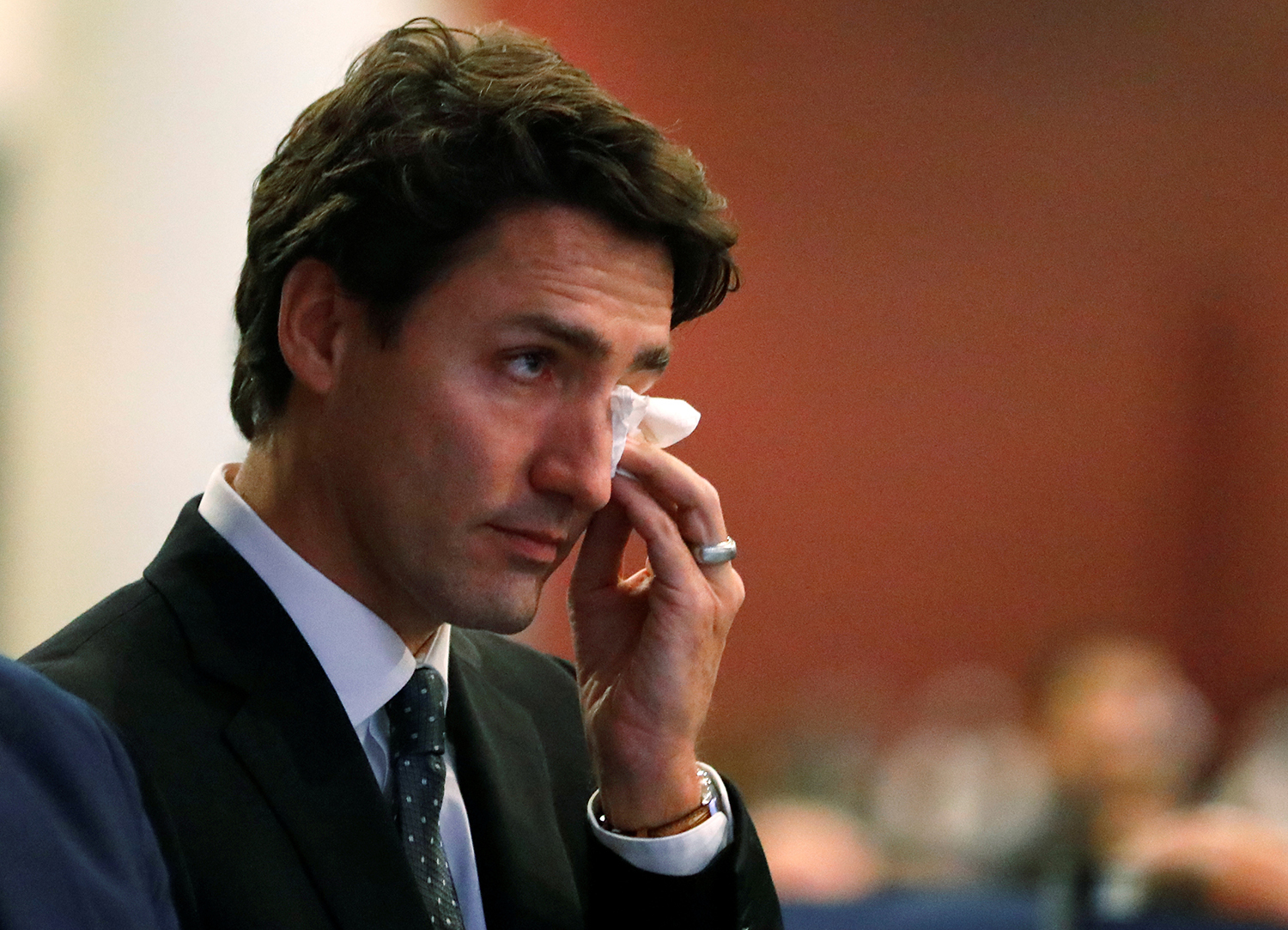 QUEBEC CITY 2017-02-03 REFILE - CORRECTING SPELLING IN BYLINECanada's Prime Minister Justin Trudeau wipes a tear during funeral services for three of the victims of the deadly shooting at the Quebec Islamic Cultural Centre, at the Congress Centre in Quebec City, Quebec, February 3, 2017.  REUTERS/Mathieu Belanger   TPX IMAGES OF THE DAY Photo:  / REUTERS / TT / kod 72000