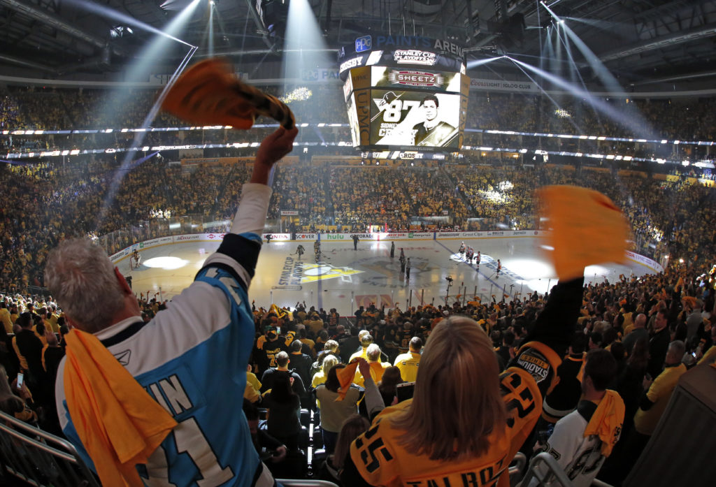 Pittsburgh Penguins fans wave towels during player introductions before Game 1 of an NHL first-round hockey playoff series between the Pittsburgh Penguins and the Philadelphia Flyers in Pittsburgh, Wednesday, April 11, 2018. The Penguins won 7-0. (AP Photo/Gene J. Puskar)