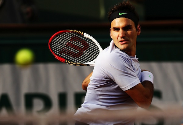 Roger Federer är klar för sin 36:e raka Grand Slam-kvartsfinal – efter karriärens 900:e seger. FOTO: BILDBYRÅN