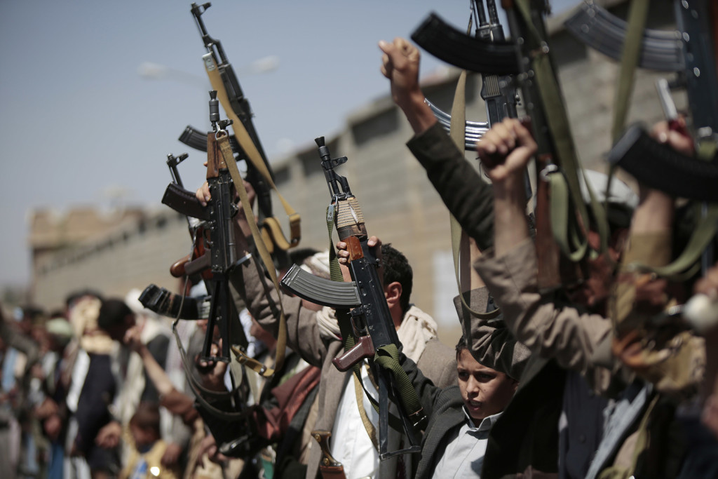 Tribesmen loyal to Houthi rebels, hold their weapons as they chant slogans during a gathering aimed at mobilizing more fighters into battlefronts in several Yemeni cities, in Sanaa, Yemen, Sunday, Oct. 2, 2016. (AP Photo/Hani Mohammed)